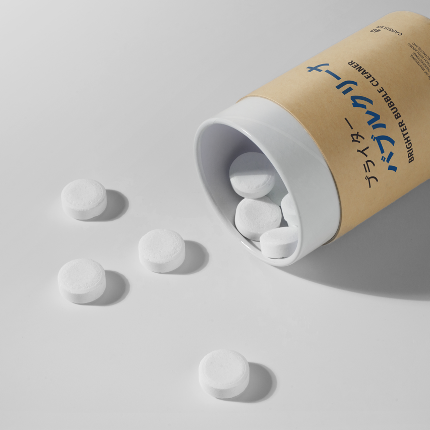 Koyo Living Brighter Bubble Cleaner in eco-friendly tube packaging with white fizzing cleaning tablets displayed on a minimal background. stain remover Malaysia, baby safe stain remover Malaysia, gentle stain remover MY. eco stain remover Singapore, natural stain remover Singapore