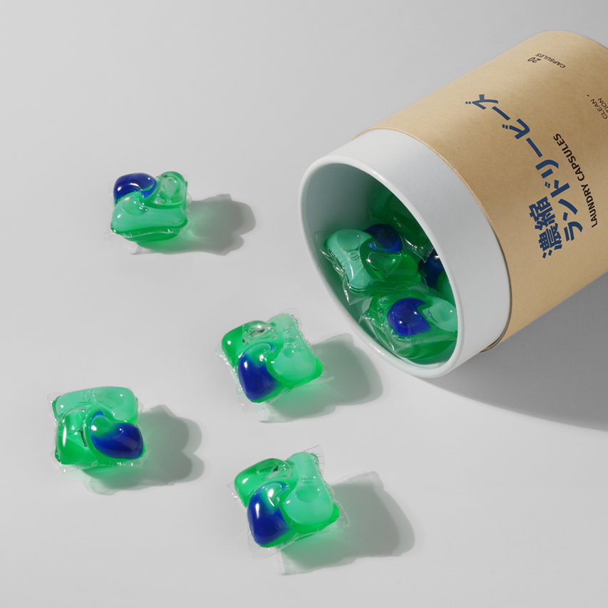 Koyo Living 4-in-1 laundry pod showing stain remover, detergent, softener, and anti-bacteria formula. Koyo Living Laundry Care Combo with detergent pods and bubble cleanser on minimalist background. detergent capsules Malaysia, baby safe laundry detergent Malaysia, gentle laundry pods MY. eco laundry pods Singapore, baby detergent Singapore, natural stain remover Singapore