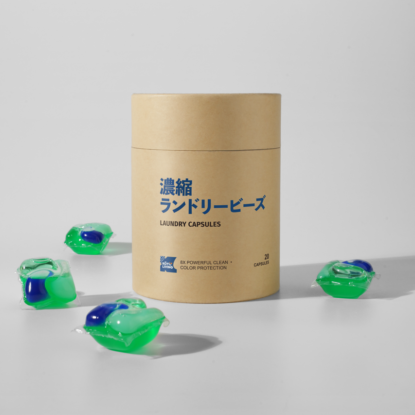 Koyo Living 4-in-1 laundry pod showing stain remover, detergent, softener, and anti-bacteria formula. Koyo Living Laundry Care Combo with detergent pods and bubble cleanser on minimalist background. detergent capsules Malaysia, baby safe laundry detergent Malaysia, gentle laundry pods MY. eco laundry pods Singapore, baby detergent Singapore, natural stain remover Singapore